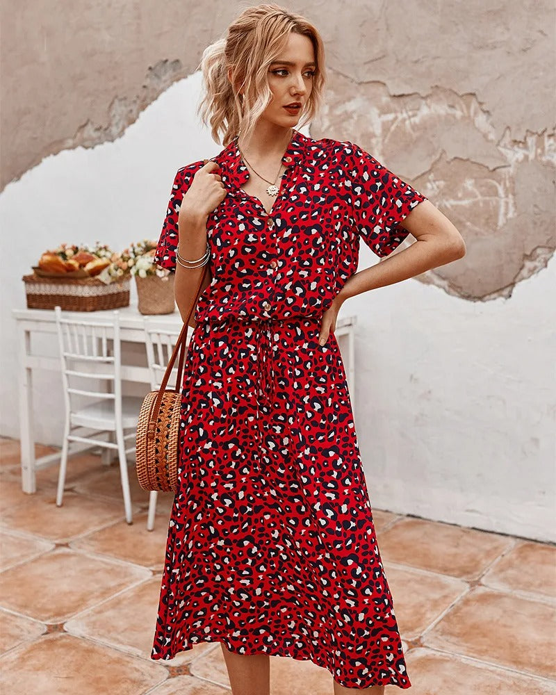 Women's short-sleeved dress with a round neckline and stitched hem