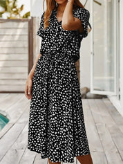 Women's short-sleeved dress with a round neckline and stitched hem