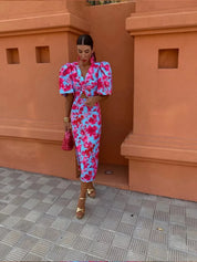 Women's midi dress with puff sleeves, figure-hugging cut and twisted waist