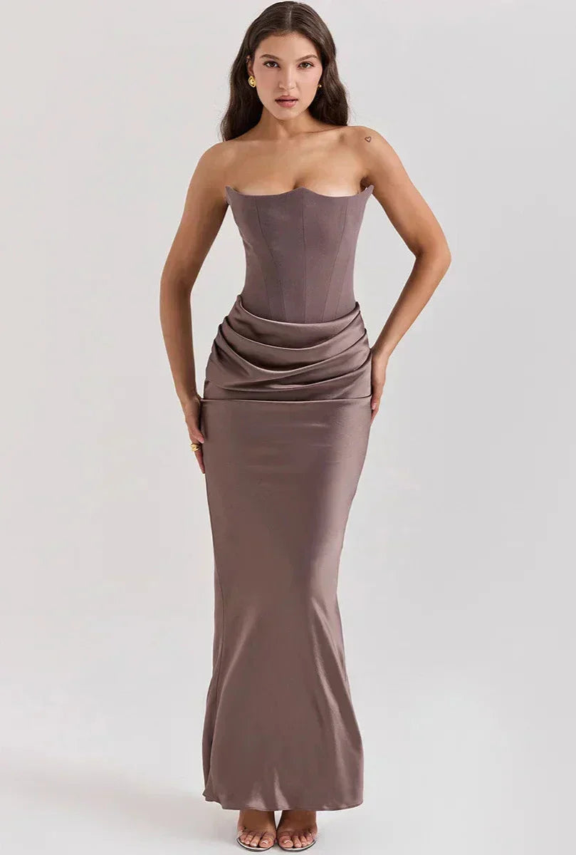 Strapless satin evening dress for women with a gathered detail at the hip.