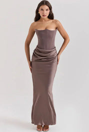 Strapless satin evening dress for women with a gathered detail at the hip.