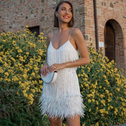 Mini cocktail dress for women with sequins and feather trim