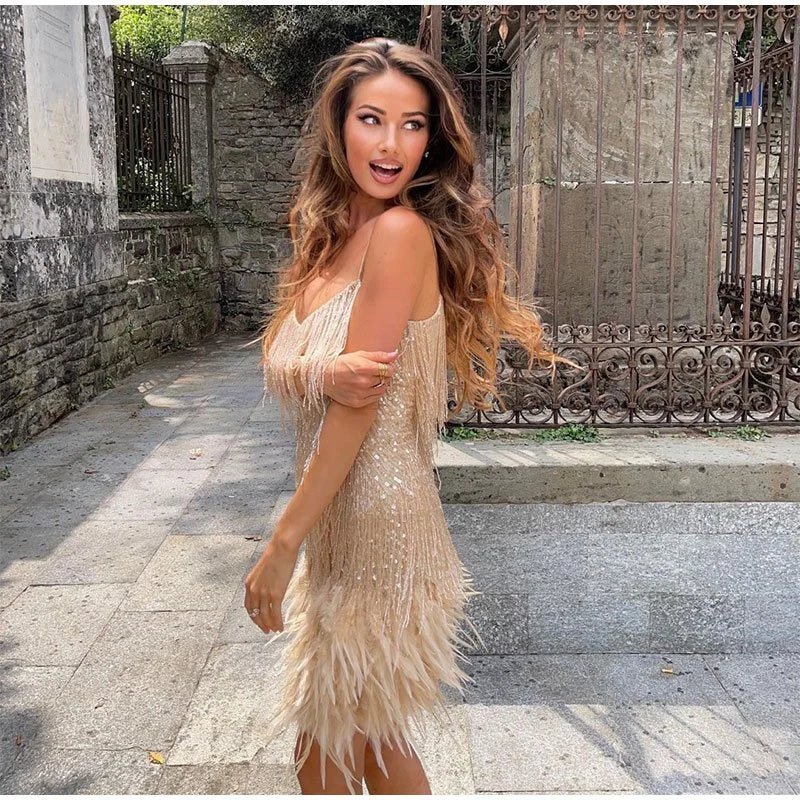 Mini cocktail dress for women with sequins and feather trim