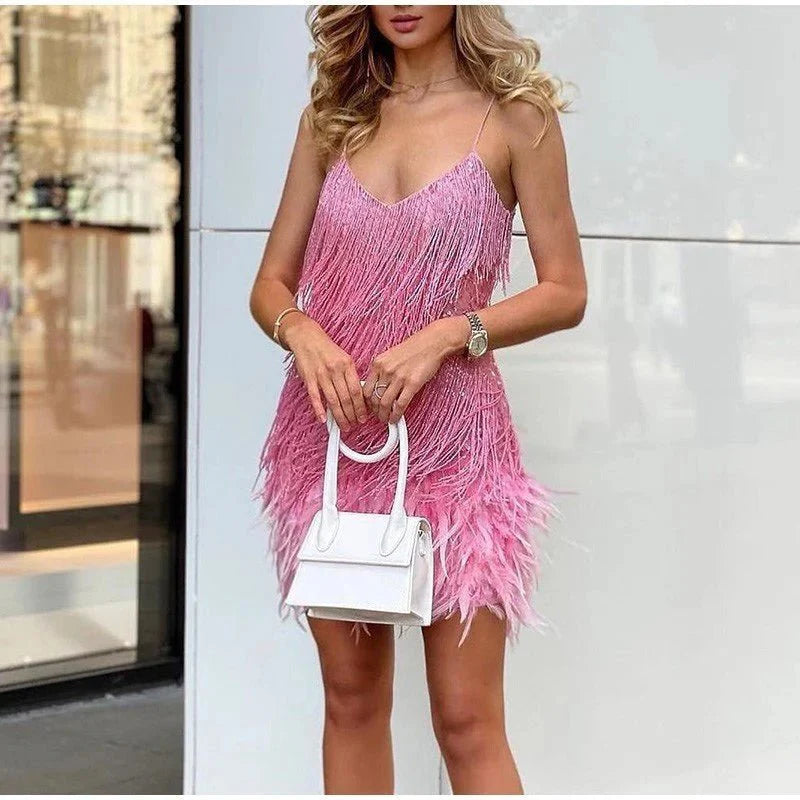 Mini cocktail dress for women with sequins and feather trim