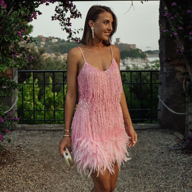 Mini cocktail dress for women with sequins and feather trim