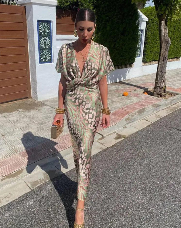 Women's midi dress with floral pattern and pleated waist