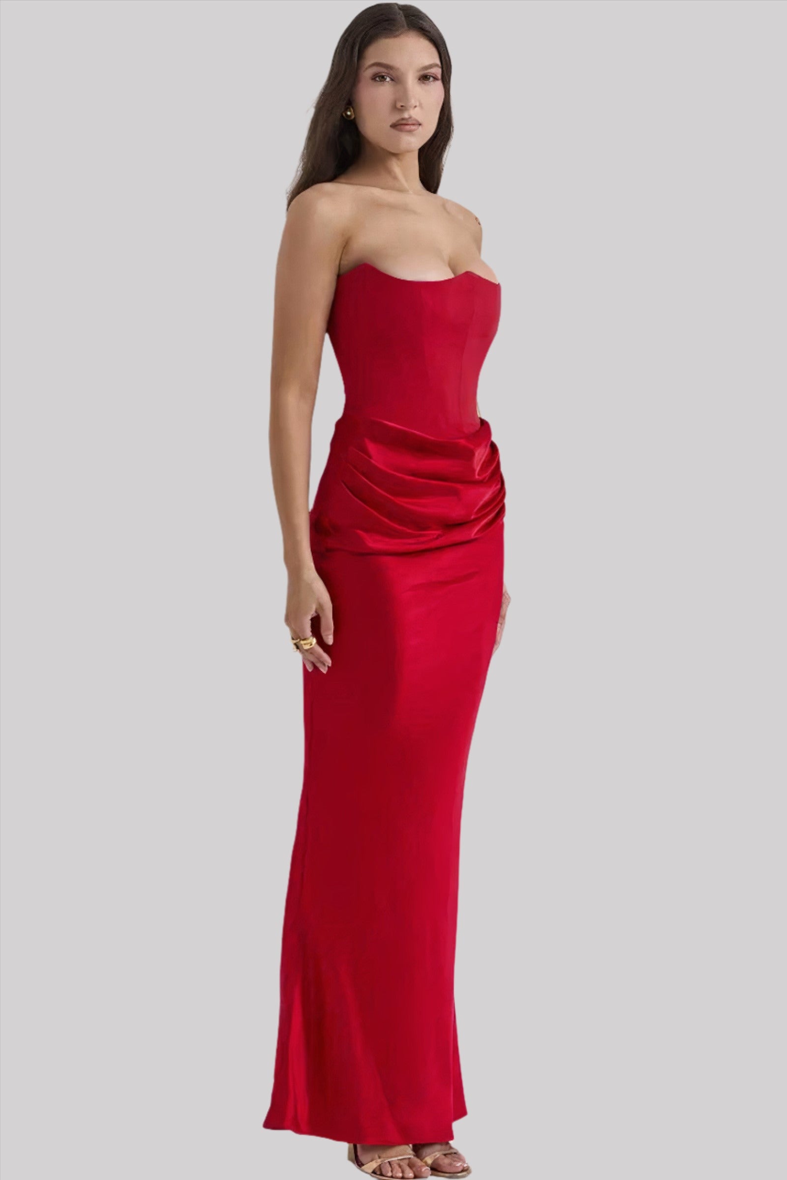 Strapless satin evening dress for women with a gathered detail at the hip.