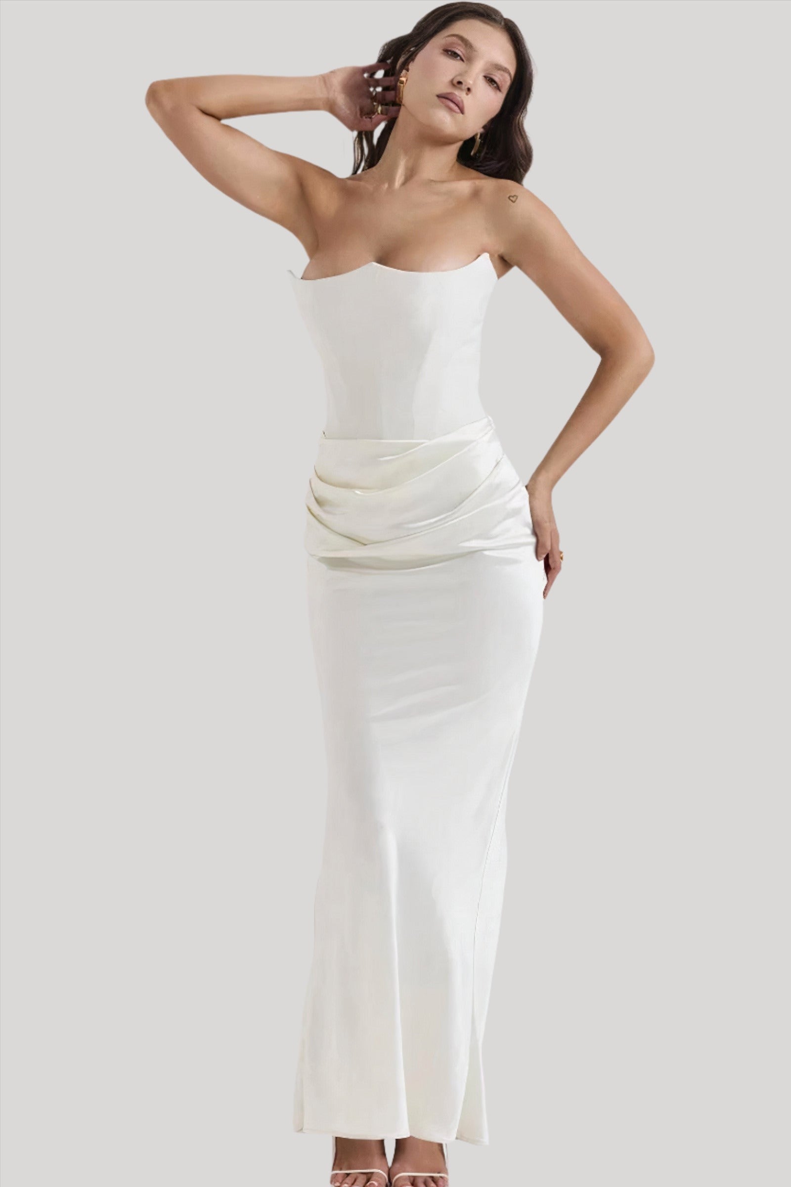 Strapless satin evening dress for women with a gathered detail at the hip.