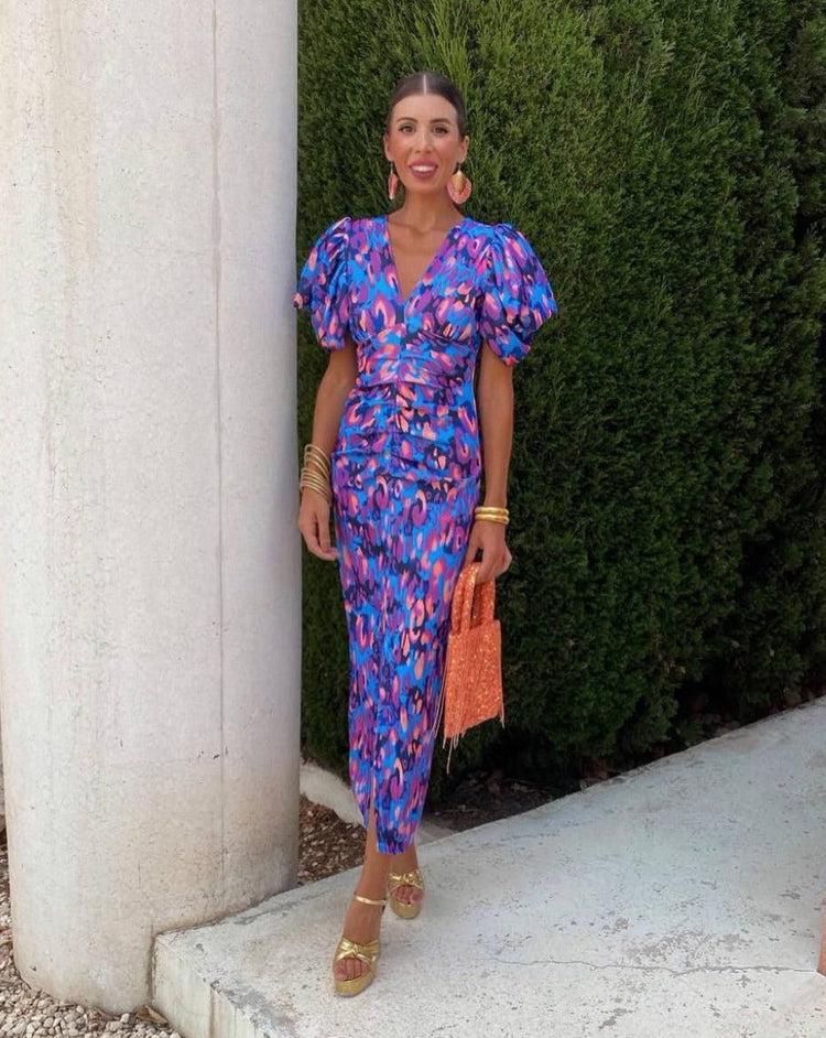 Women's midi dress with puff sleeves, figure-hugging cut and twisted waist