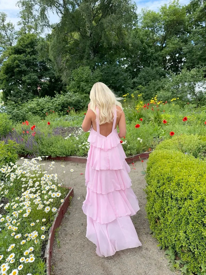 Maxi dress for women with ruffles and back cutout as well as halter neckline
