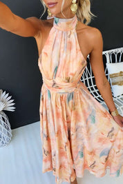 Maxi dress for women with floral pattern and halter neckline made of chiffon blend fabric