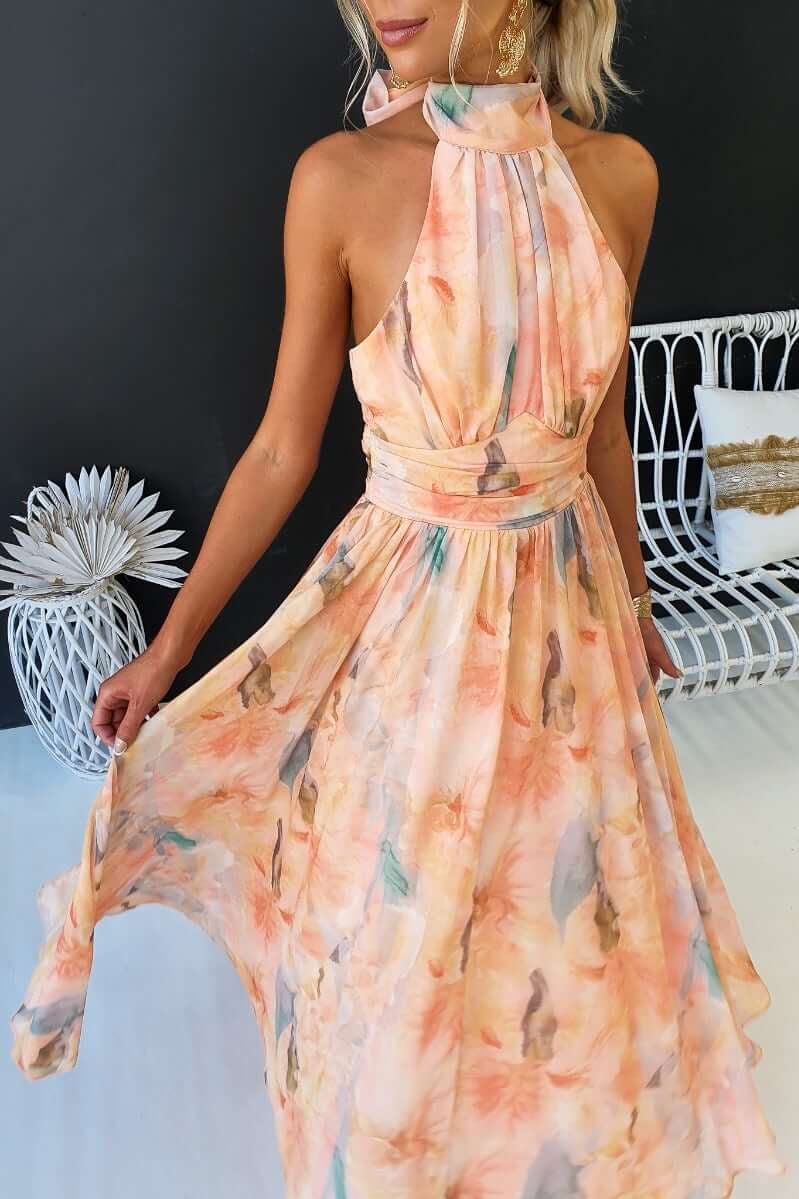Maxi dress for women with floral pattern and halter neckline made of chiffon blend fabric