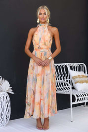 Maxi dress for women with floral pattern and halter neckline made of chiffon blend fabric