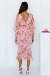 Women's midi dress with floral pattern, puff sleeves and ruffled hem