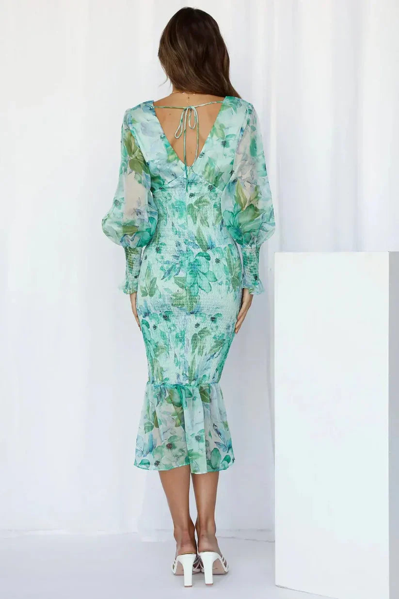 Women's midi dress with floral pattern, puff sleeves and ruffled hem
