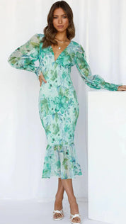 Women's midi dress with floral pattern, puff sleeves and ruffled hem