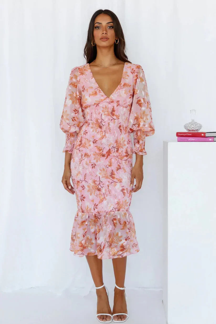 Women's midi dress with floral pattern, puff sleeves and ruffled hem