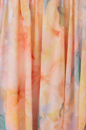 Maxi dress for women with floral pattern and halter neckline made of chiffon blend fabric