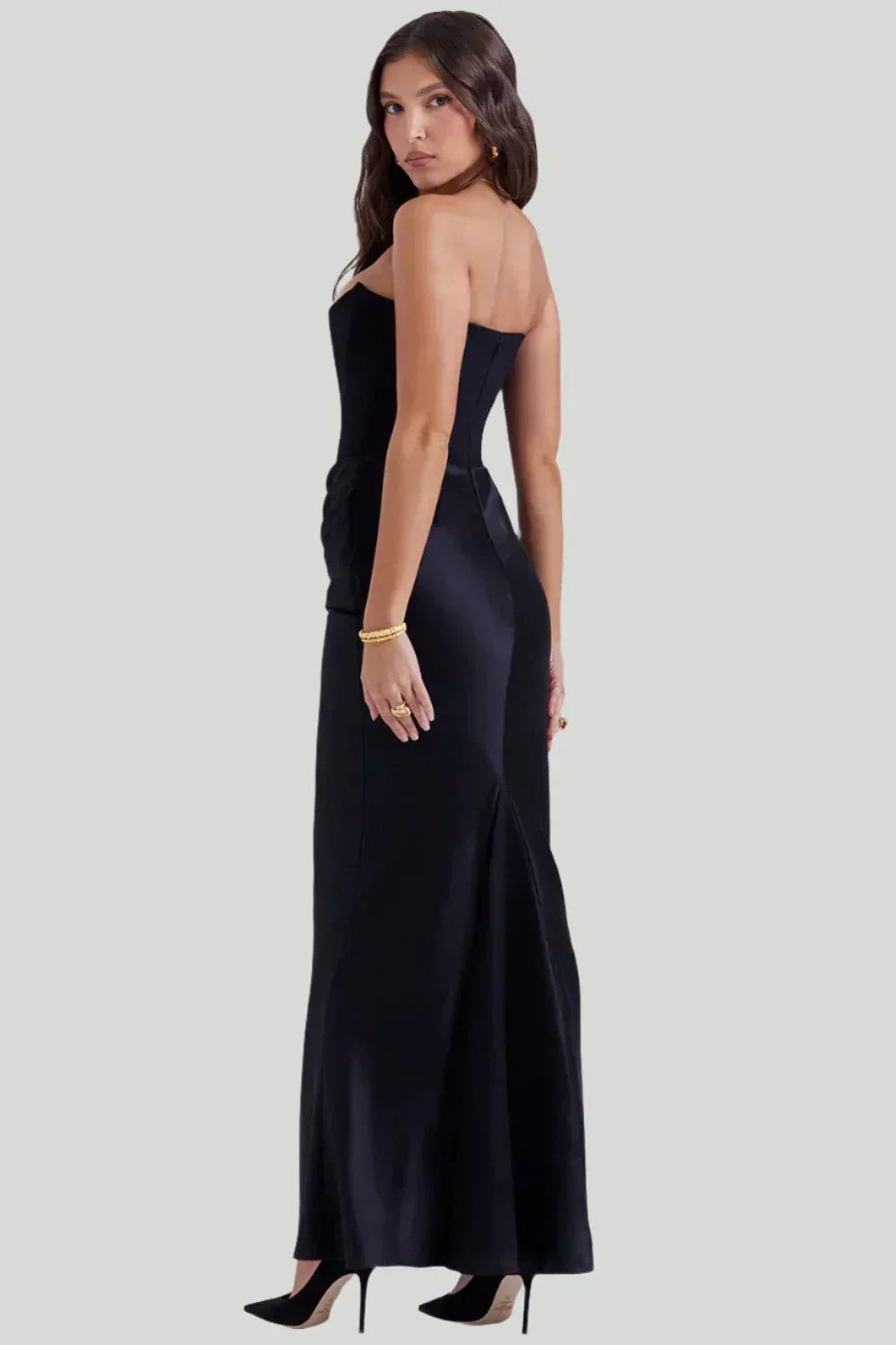 Strapless satin evening dress for women with a gathered detail at the hip.
